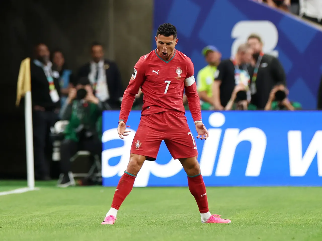 Cristiano Ronaldo of Portugal celebrates scoring his first of two World Cup goals against Uzbekistan. He becomes the first player to score in six World Cups.