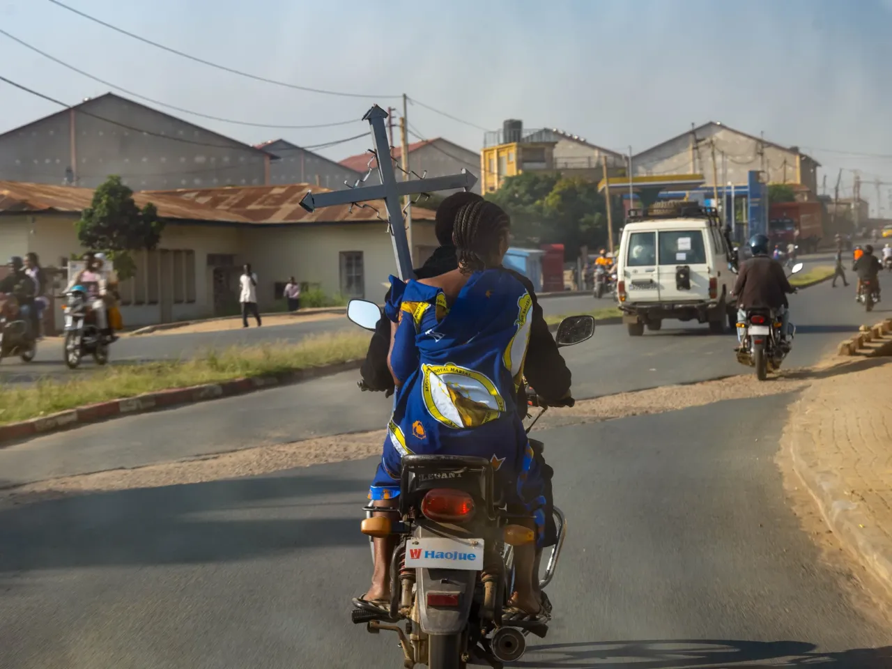 Inside the gold-mining town where the Ebola outbreak likely started 2 A woman carrying a funeral cross rides on a motorcycle taxi through Bunia, the capital of Ituri province, in the Democratic Republic of Congo, on June 18. Funeral processions and other signs of mourning have become increasingly common as eastern Congo battles an Ebola outbreak.
