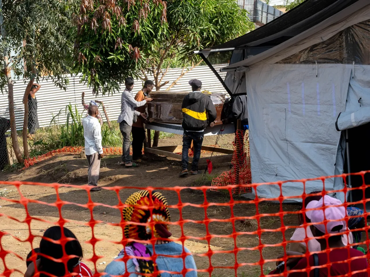 Inside the gold-mining town where the Ebola outbreak likely started 3 A view of the morgue at the Ebola treatment center of the Evangelical Medical Center in Bunia on June 18, as staff prepare the body of a person who died from Ebola. The facility is part of the region's response to the outbreak spreading through eastern Congo.