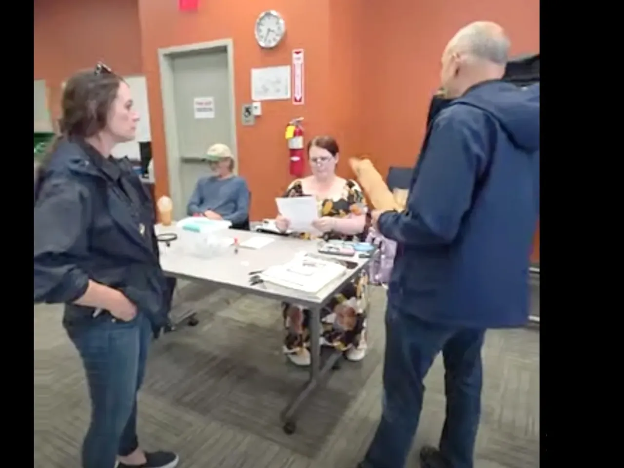 Federal agents confront Paigelynn Gonyea at a polling place in Syracuse, NY on June 23, 2026 in a video captured by another pollworker on the scene.