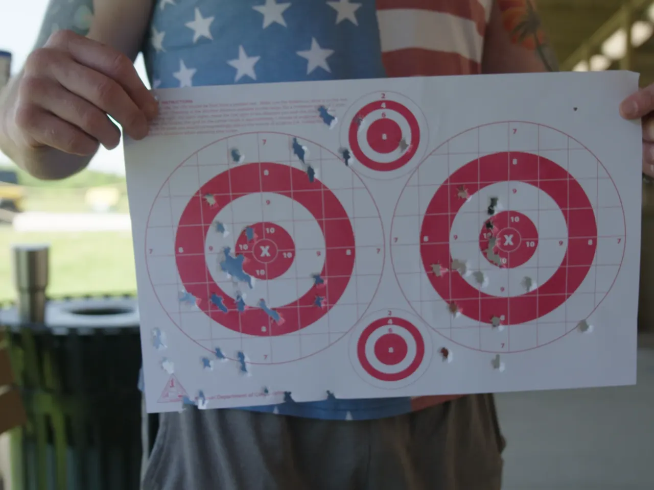 Matthew Mealer holds up his targets at the Busch Shooting Range in Weldon Spring, Missouri, in May. Mealer said he's generally skeptical of new vaccines but might consider one for Lyme disease if it proves safe and effective.
