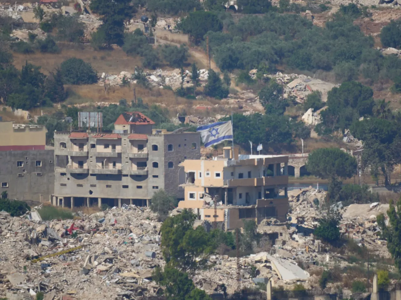 U.S. and Iran exchange strikes, underscoring the fragility of the ceasefire 1 An Israeli flag tops a destroyed building in southern Lebanon, as seen from northern Israel, Sunday, June 28, 2026.