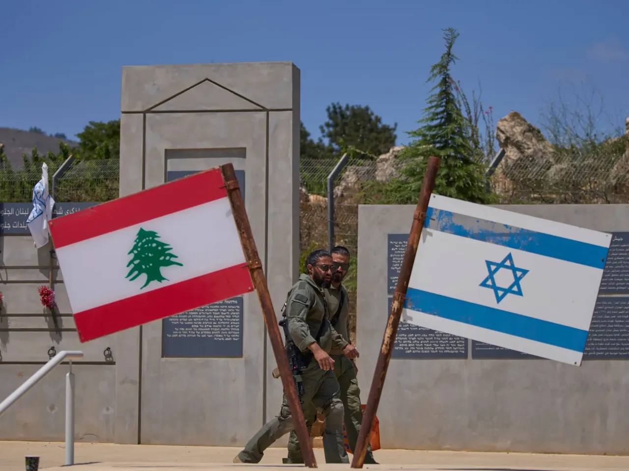 U.S. and Iran exchange strikes, underscoring the fragility of the ceasefire 2 Israeli soldiers are seen at a memorial site on the border with Lebanon in northern Israel, Sunday, June 28, 2026.