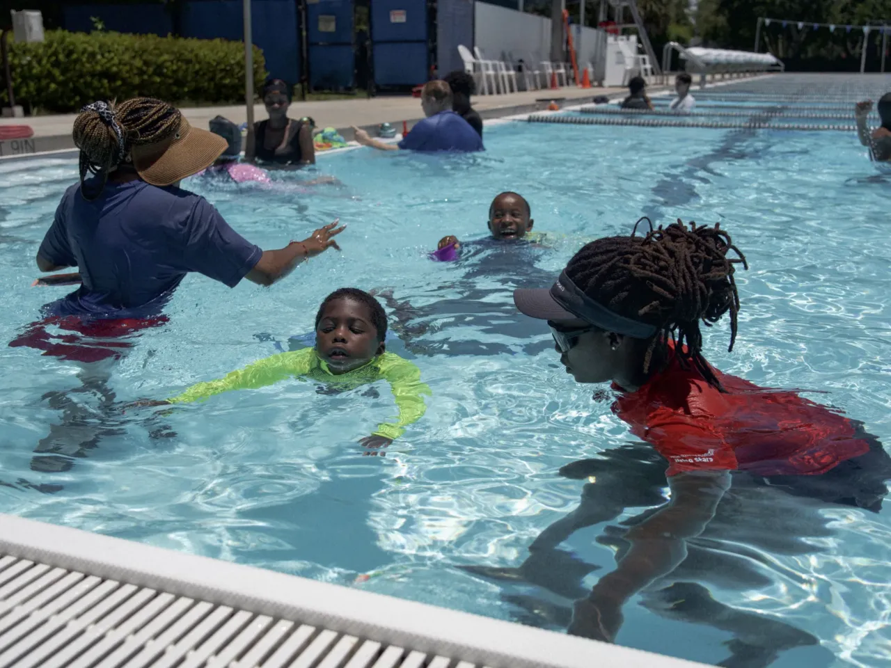 Water may be sensory bliss for kids with autism — but it can also be a threat 1 Recreational therapist Tiera Chaney works with Amir Williams, 6, during a recent Swim Buddies session.