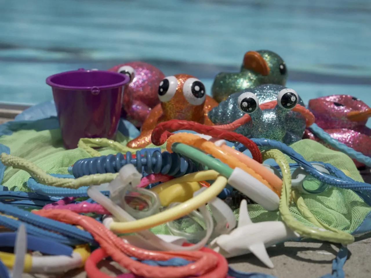 Water may be sensory bliss for kids with autism — but it can also be a threat 2 A selection of colorful, sparkly toys are often used for positive reinforcement and redirection in Swim Buddies lessons.