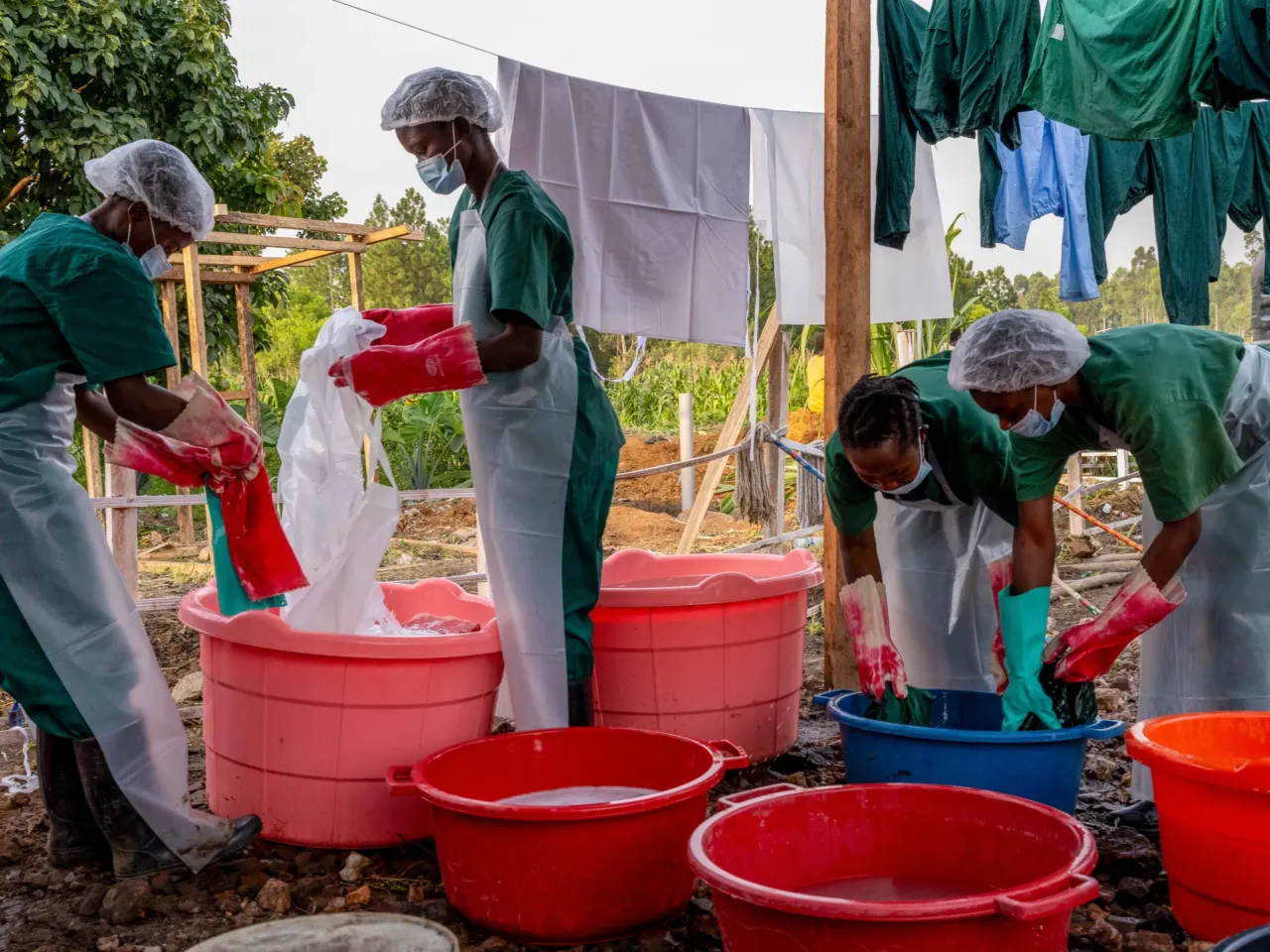 'It takes a lot of courage': DR Congo health workers battle Ebola 1 Hygiene workers assigned to the laundry unit of the Rwampara Ebola Treatment Centre clean personal protective equipment (PPE) used by healthcare workers in Ituri Province, eastern Congo, June 14, 2026.