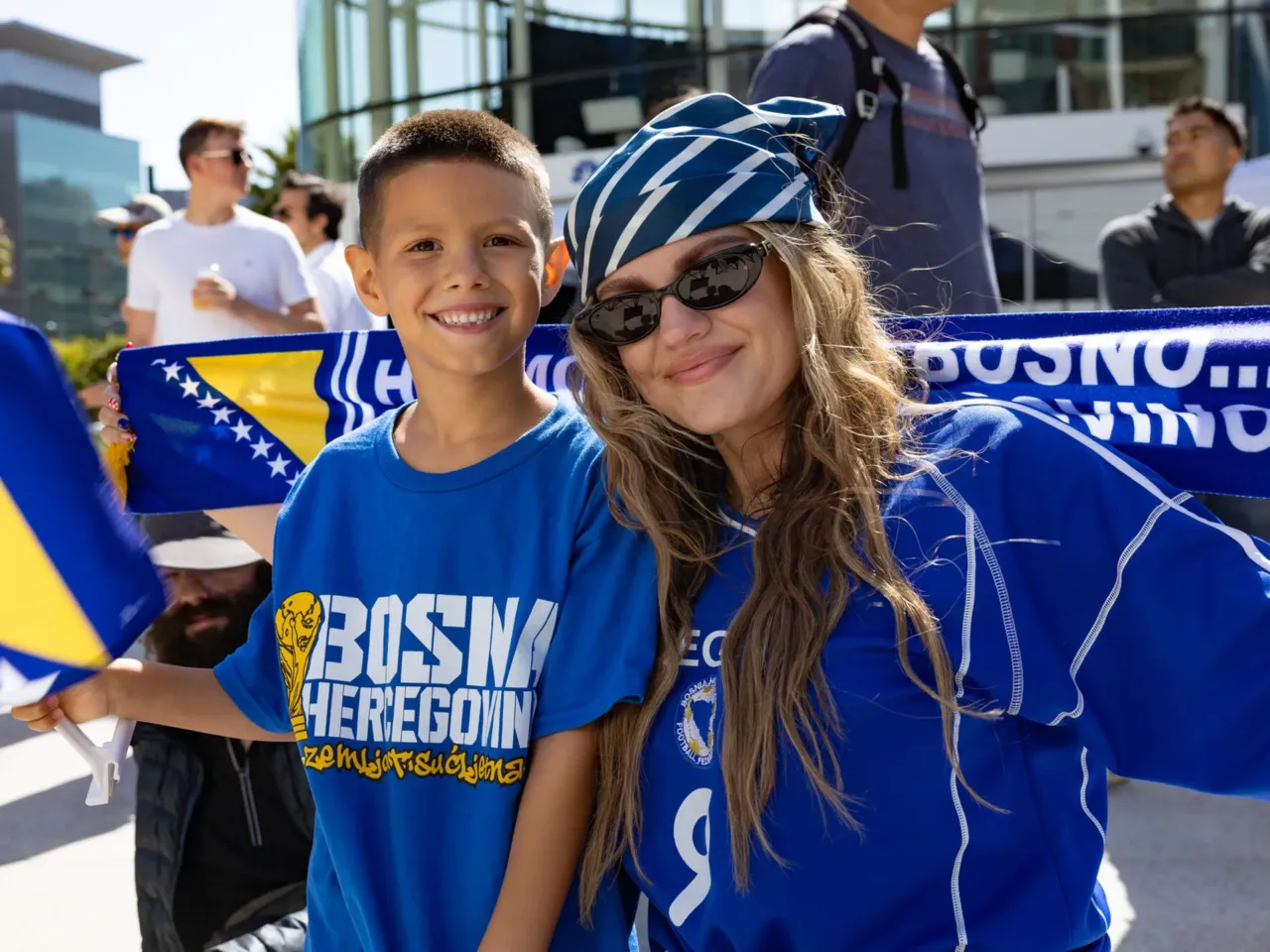 Irma Aguirre and her son, Leo, 7, both Bosnia-Herzegovina fans, pose for a photo at Thrive City in San Francisco.