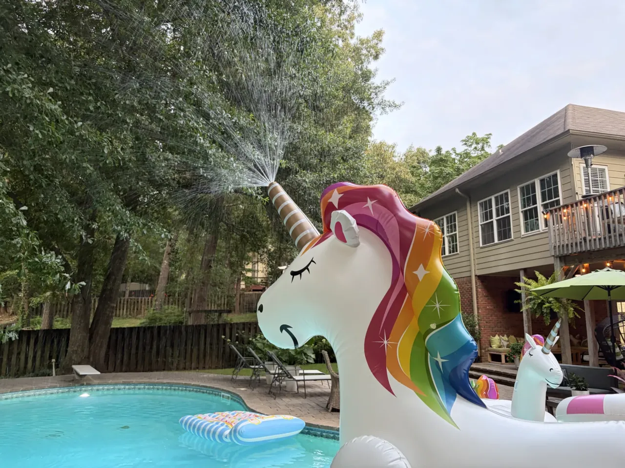 A hot summer trend in the sharing economy? Rental swimming pools 1 A unicorn inflatable sprinkler sprays water across Jasmine Lawson's pool in Birmingham, Ala., on June 24.