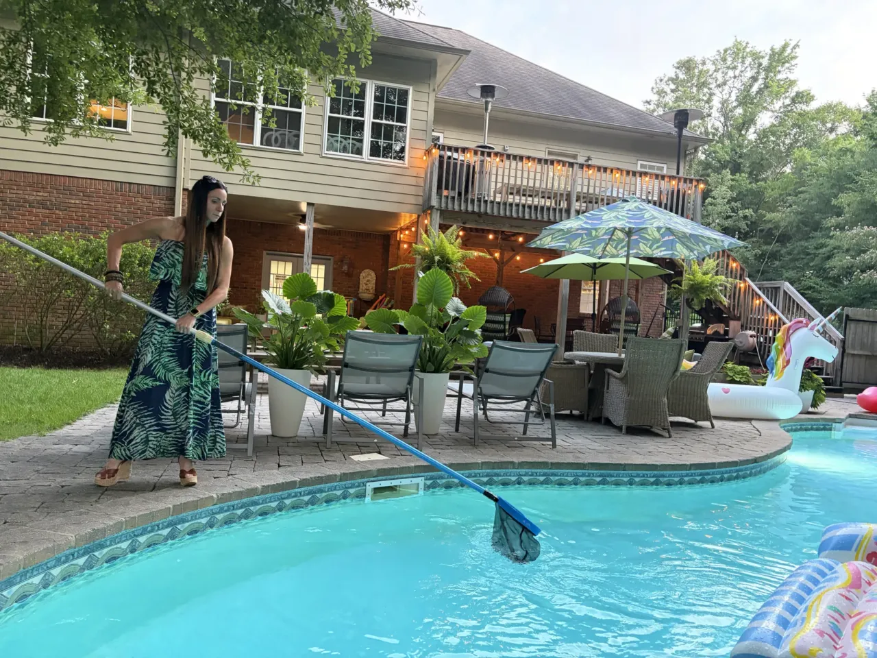 A hot summer trend in the sharing economy? Rental swimming pools 2 Jasmine Lawson skims her pool in Birmingham, Ala., on June 24.