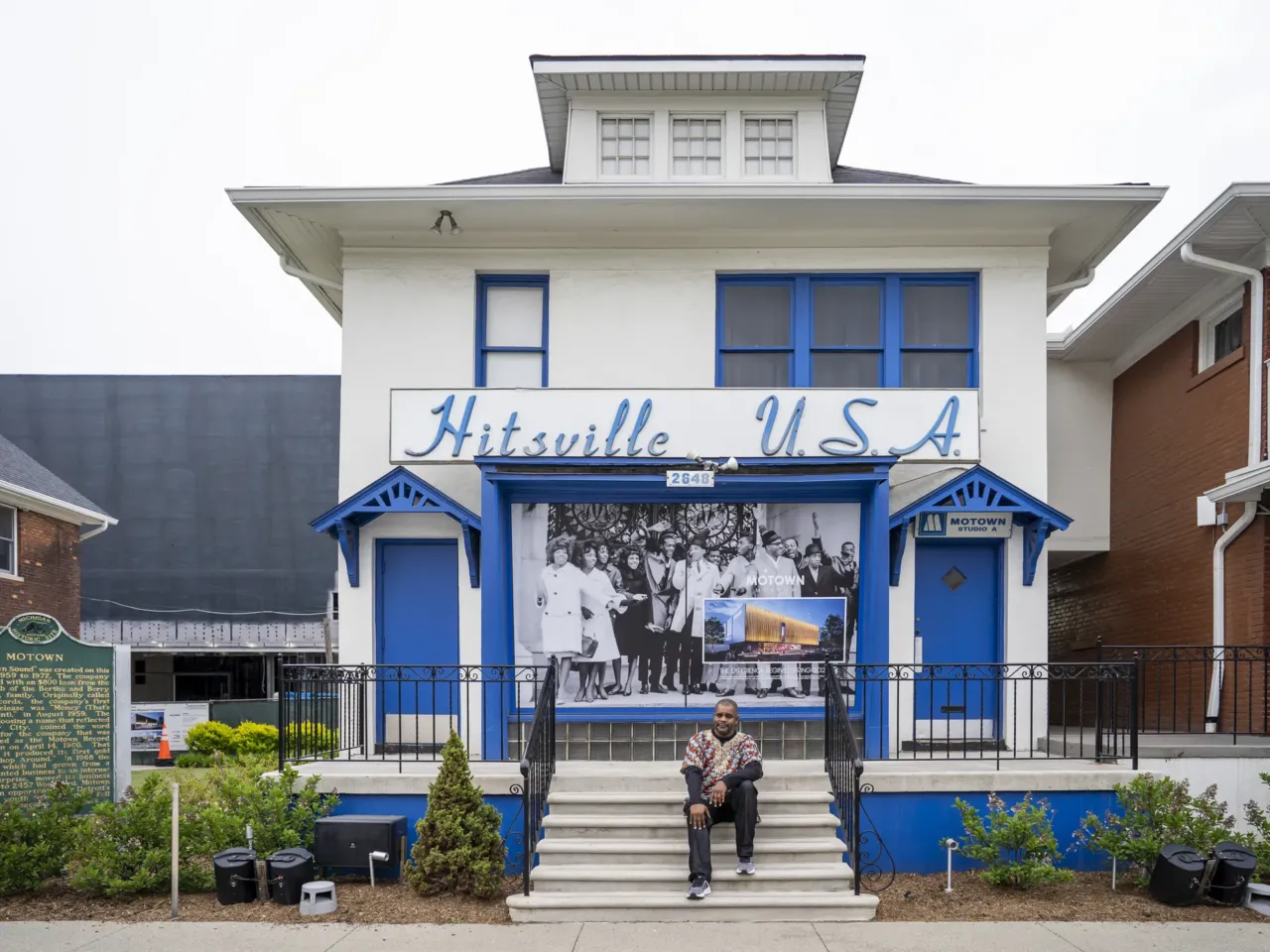 Jamon Jordan, Detroit's official historian, sits on the porch of the original site of Motown Records, now a museum, on May 12, 2026. In September 2024, the museum broke ground for a $75 million expansion, projected to be completed within the next year.