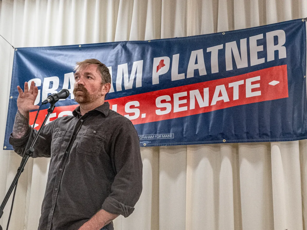 Graham Platner speaks to voters at a town hall at the Elks Lodge 188 on June 7, 2026 in Portland, Maine.