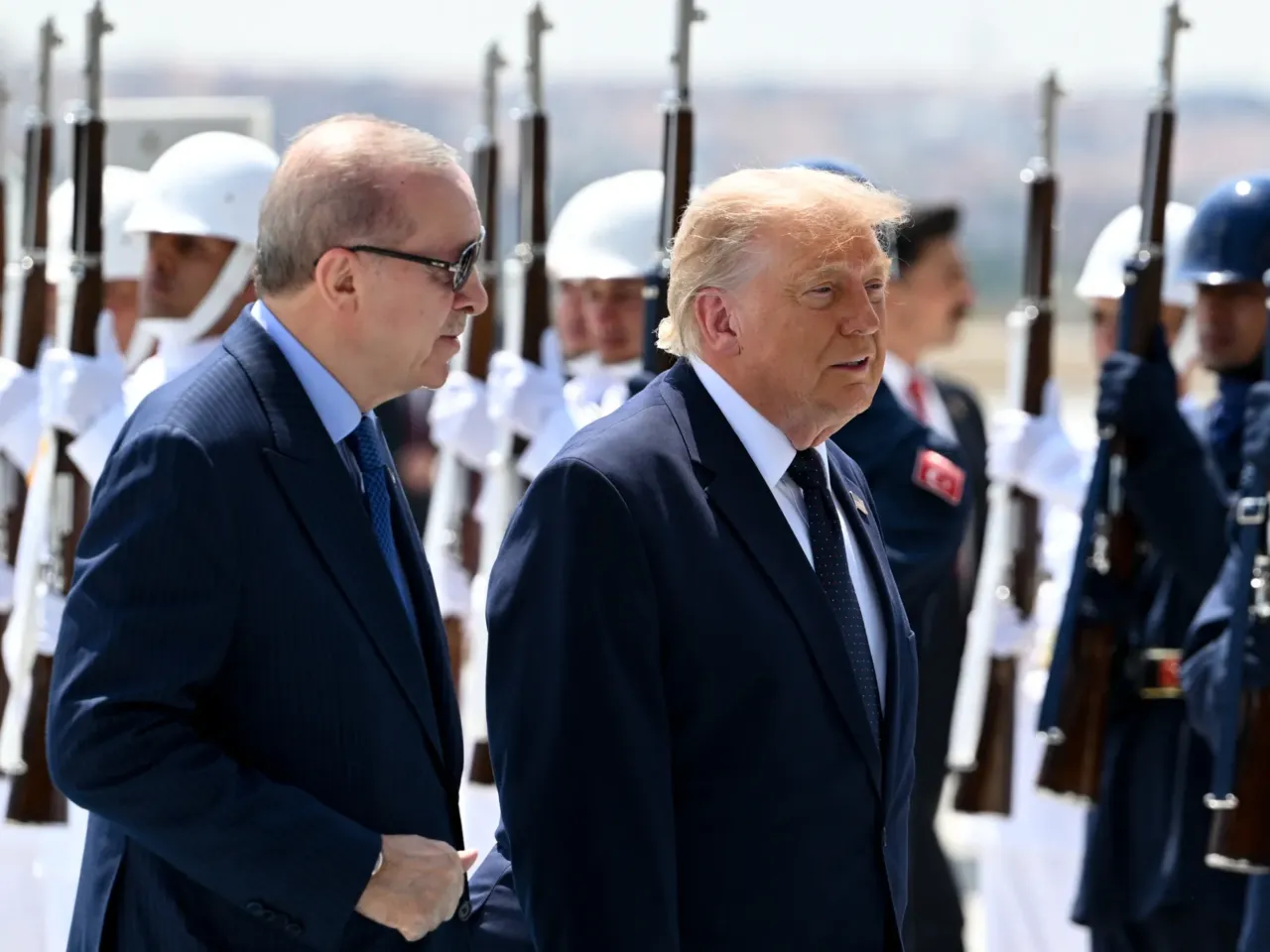 Turkish President Recep Tayyip Erdogan welcomes President Trump upon his arrival at Etimesgut Air Base near Ankara, Turkey, on July 7 before attending the NATO summit.
