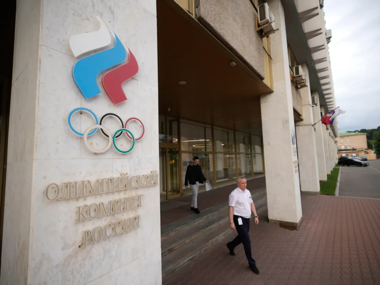 A man walks outside the Russian National Olympic Committee building in Moscow on Tuesday.