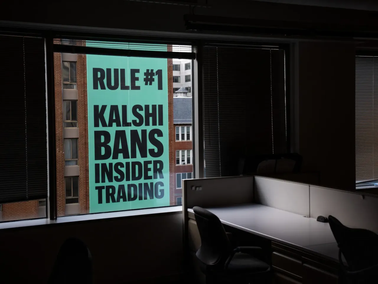 A banner for the prediction market platform Kalshi hangs from a building on April 1.