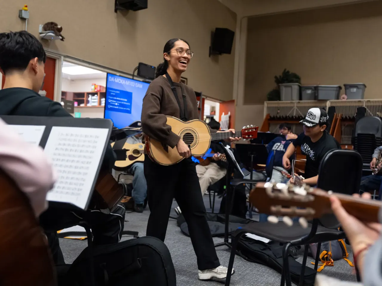 Under a new federal rule, colleges must leave grads better off or lose financial aid 1 Cindy Flores smiles as she teaches mariachi to students at McKay High School in Salem, Oregon. "If it wasn't for PSU and the loans I could get … I wouldn't be a Mexican American mariachi teacher for my Mexican American students," she said.