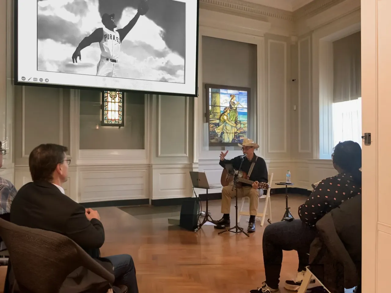 Patriotic art gets the spotlight as NEA funding shifts. Cue 'The Ronald Reagan Overture' 2 Juan Díes performs Corrido de Roberto Clemente, a ballad about the famous baseball player.