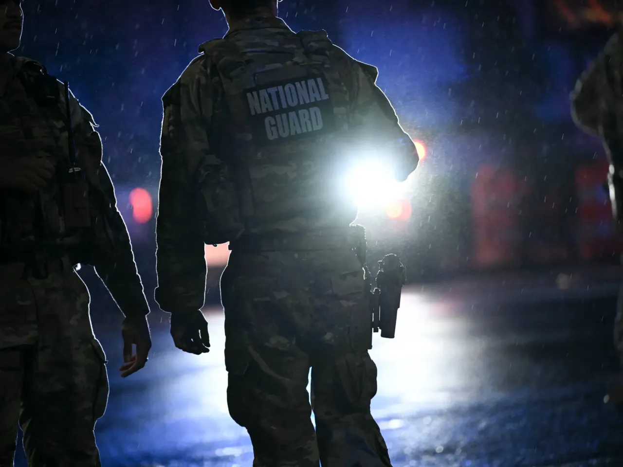 Minnesota is pulling troops early from D.C., as pressure grows on Michigan 1 Members of the National Guard stand near the White House after a gunman opened fire in Washington, DC, on May 23, 2026.