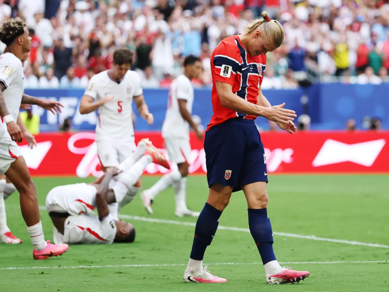 Erling Haaland (R) of Norway reacts during the World Cup quarterfinal match between Norway and England on Saturday in Miami Gardens, Fla.