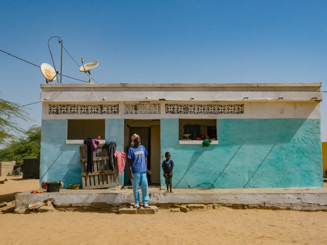 A promising tale from Senegal of fish, rice .... and dangerous worms 10 Abou Diallo was able to paint and renovate his house from the extra money he earned after adding fish to his rice farm boosted crop yields.