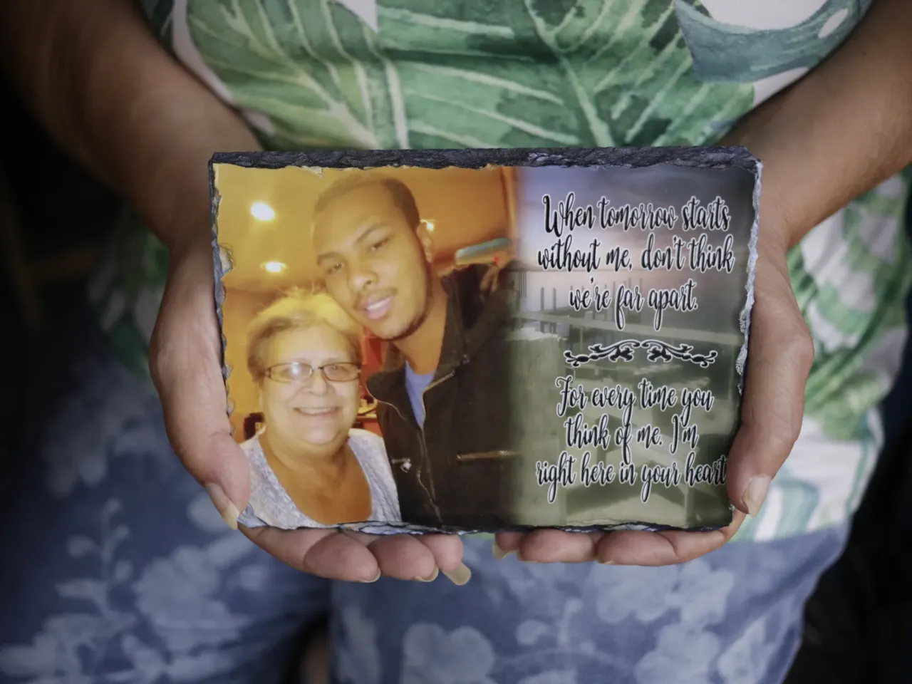 Cindy Leachman Aldridge holds a photo of her late grandson, Jonah Neal, at her home on July 12 in Owensboro, Ky. Jonah Neal was killed on May 20 in Memphis, Tenn., during an encounter with federal agents from the Memphis Safe Task Force.
