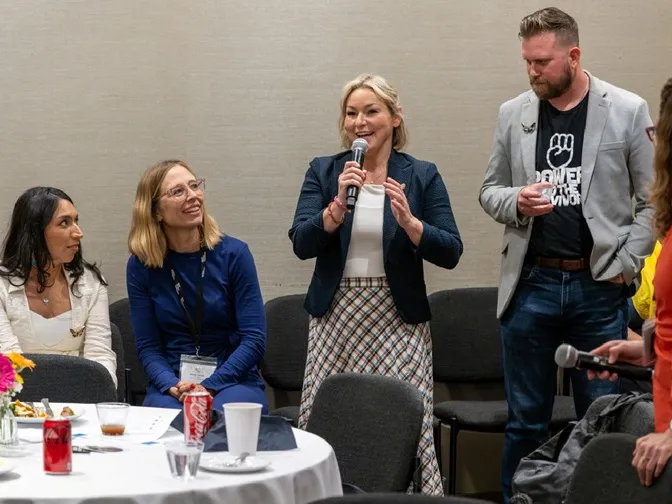 Democrats' witness opposing Blanche's confirmation is more than an Epstein survivor 4 Dani Bensky (center) speaks at the World Without Exploitation conference in June, while Annie Farmer (left, in blue) looks on.