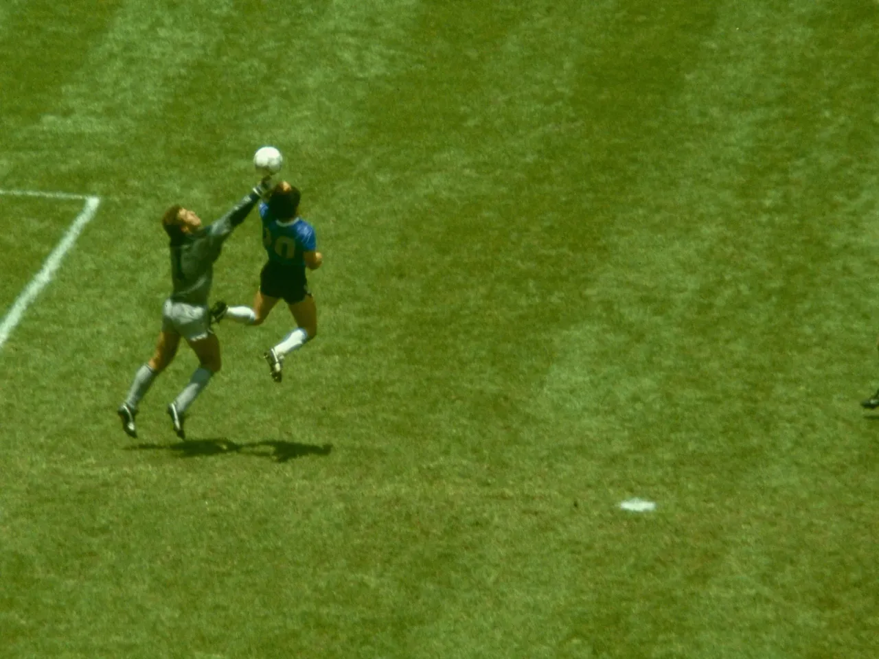 Old rivals, new battle: Argentina and England clash in World Cup Semifinal 1 Argentina's Diego Maradona scores his infamous "Hand of God" goal over England goalkeeper Peter Shilton during the 1986 FIFA World Cup quarter-final at Mexico City's Azteca Stadium on June 22, 1986, as England defenders Kenny Sansom (top), Gary Stevens (center), and Terry Fenwick look on.