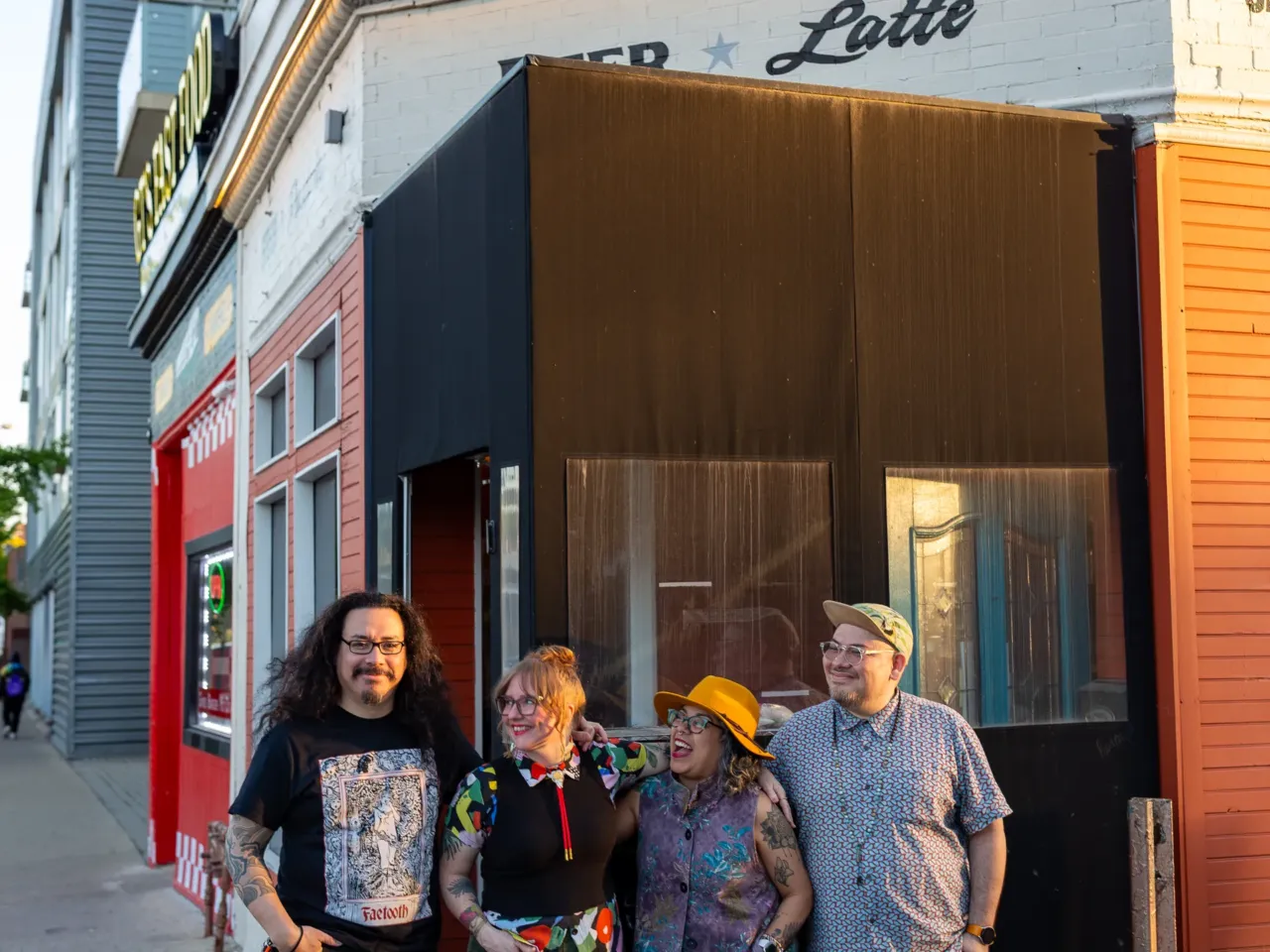 What do a bar and a Muslim community organization have in common? 1 Bar co-managing partners (from left) Juan Bermudez, his wife Sam Bermudez, and their relatives Ana Bermudez and David Chavez pose for a portrait outside the entrance at Nighthawk on May 15.
