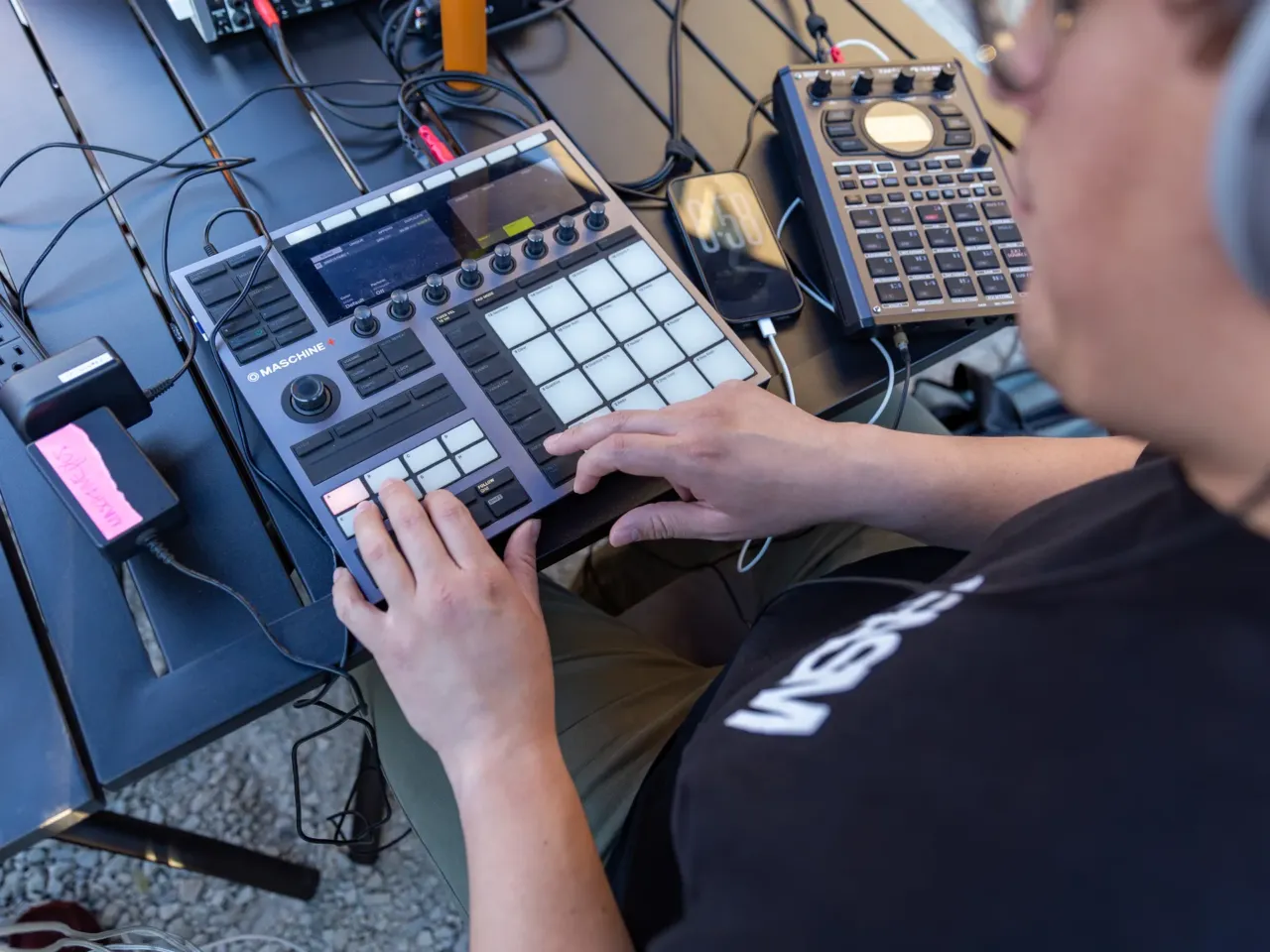What do a bar and a Muslim community organization have in common? 3 Artist Fernando Bounce works on his beats at Nighthawk.
