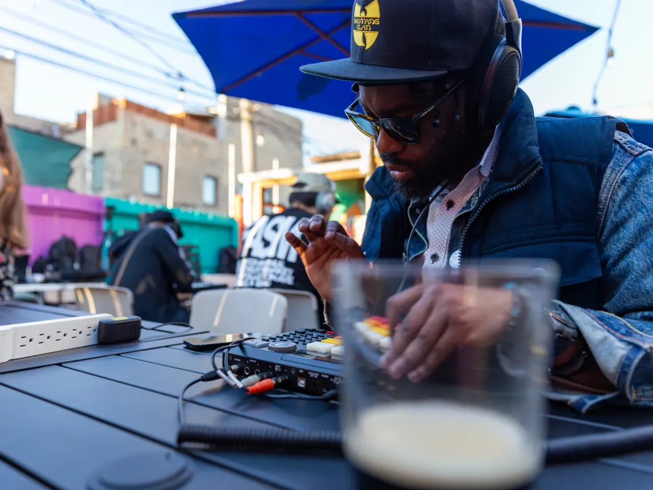 What do a bar and a Muslim community organization have in common? 4 Artist SLGHTR! 13x works on his beats.