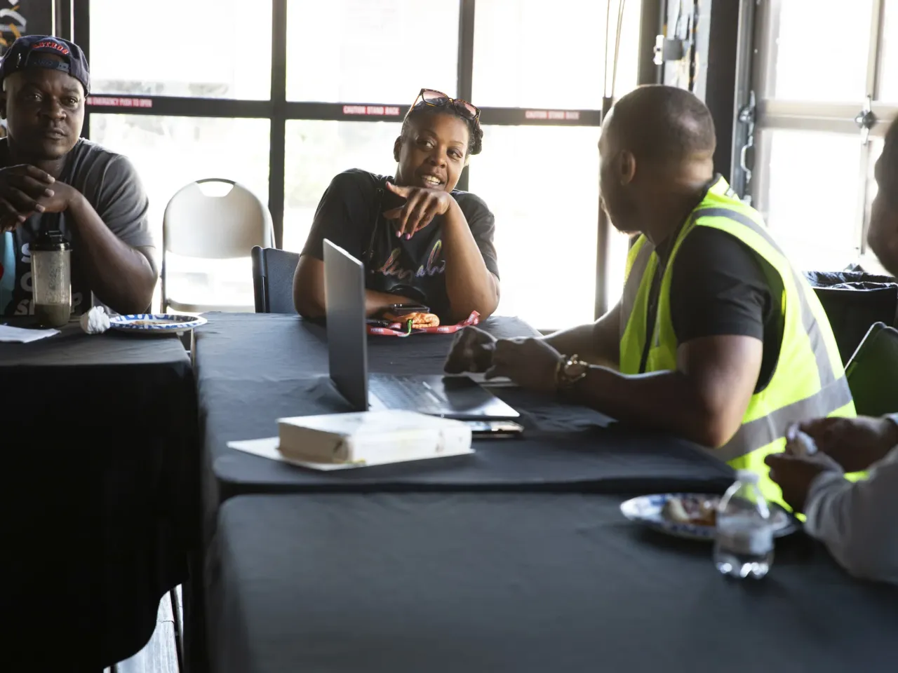 What do a bar and a Muslim community organization have in common? 13 Latara Sutton shares her thoughts during the weekly IMAN organizing committee meeting on July 8 in Chicago.