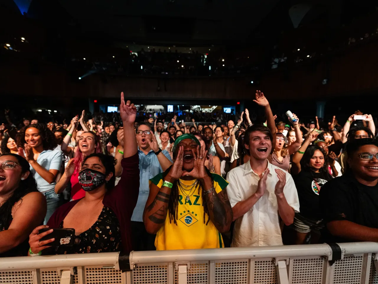 10 photographers share favorite moments from the Tiny Desk Contest Tour 8 The audience at the NPR Tiny Desk Contest On The Road tour at The Howard Theatre in Washington, D.C., on Saturday, July 11, 2026, cheers at the concert.