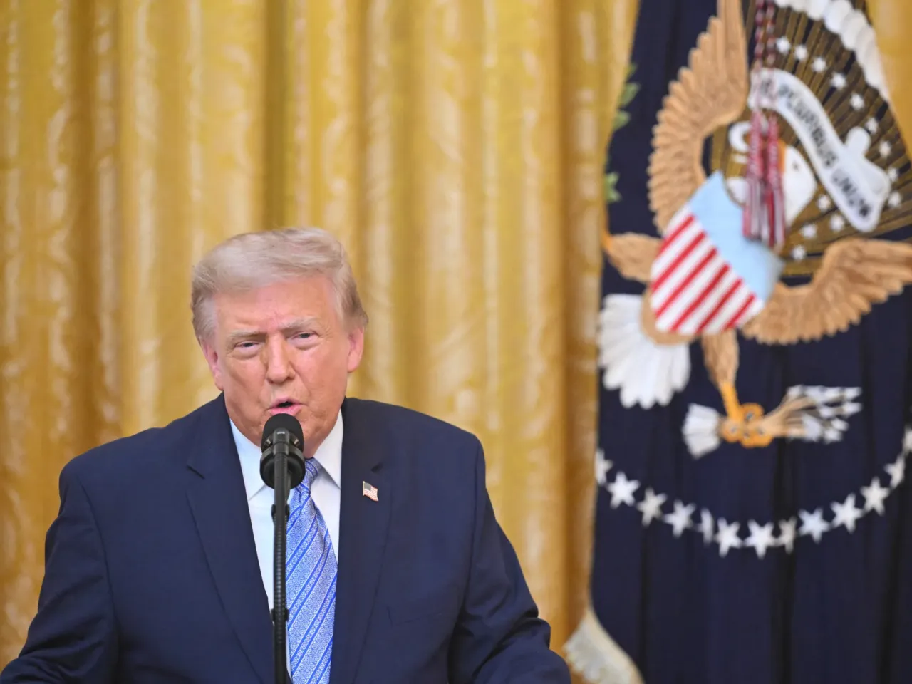 President Trump addresses the nation from the East Room of the White House.
