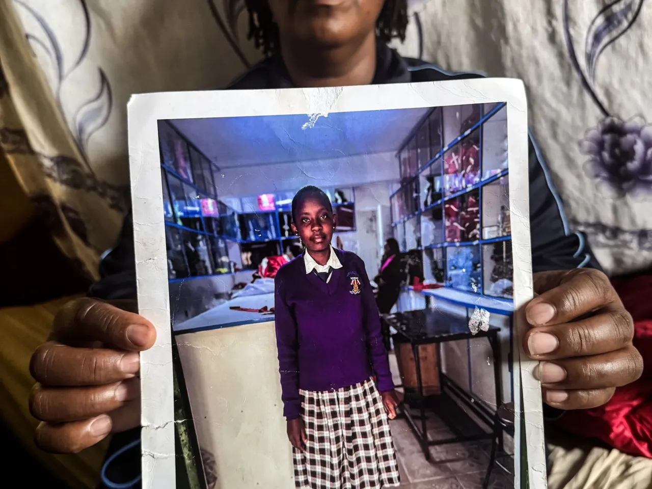 Trump's team says 'no children' died from USAID cuts. Consider these 3 cases 2 Rachael Wanjiru, 43, holds a photo of her 16-year-old daughter, Purity Wamboi, who died from tuberculosis-related complications after missing her medication.
