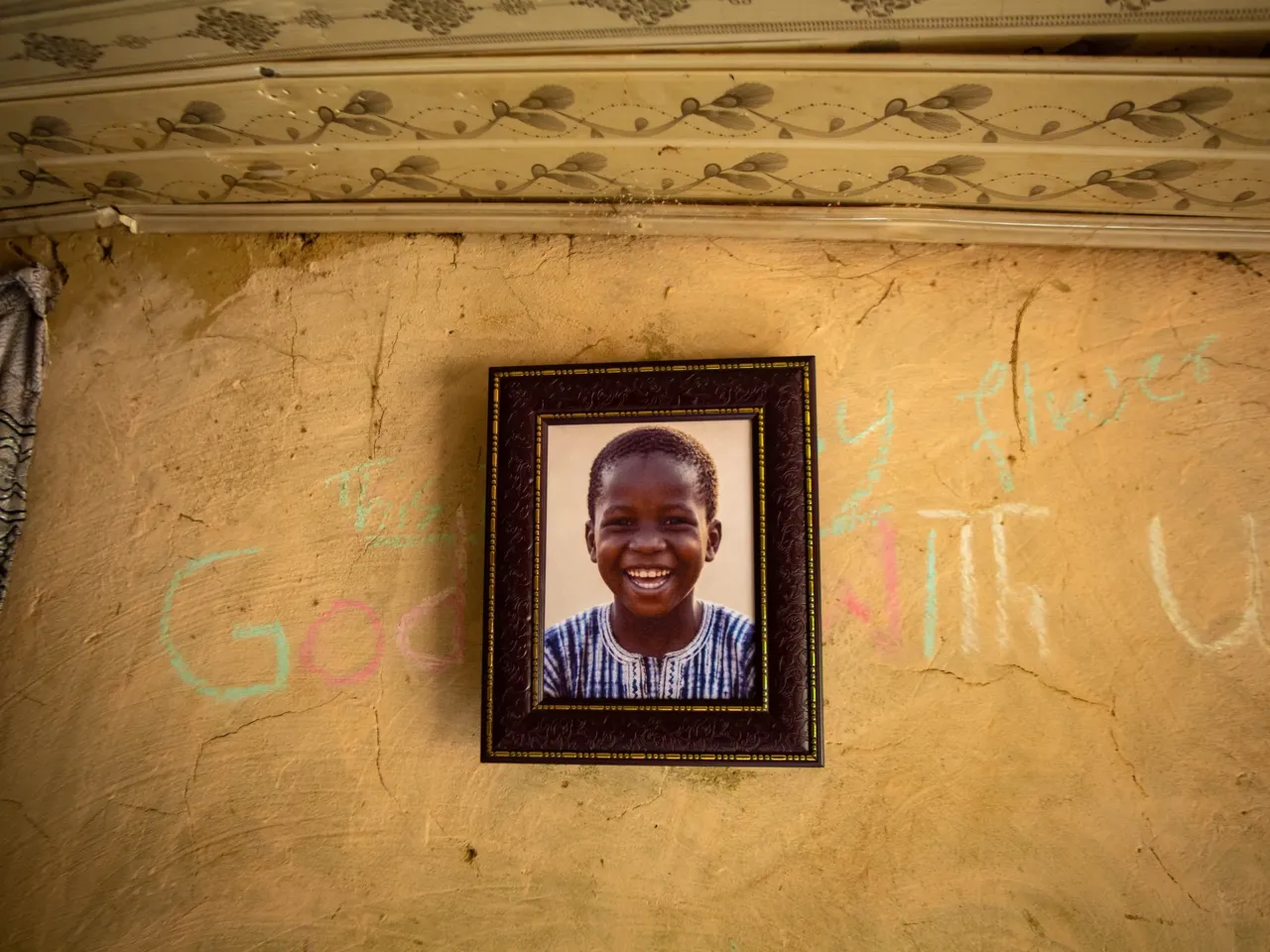 Trump's team says 'no children' died from USAID cuts. Consider these 3 cases 5 Ibrahim Garba's portrait hangs inside his family's home. The boy had written, "God is with us" on the wall.