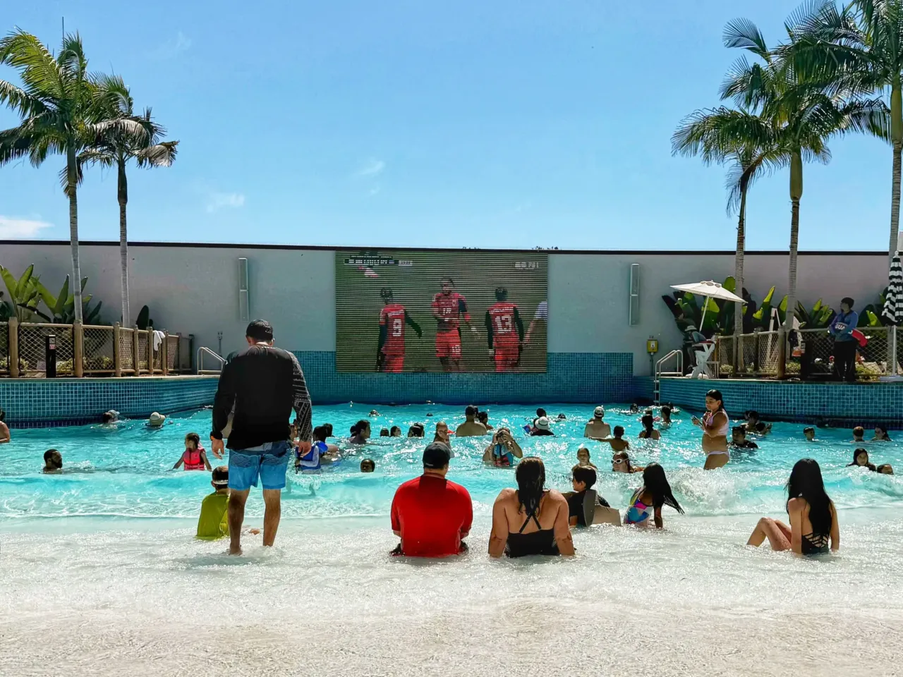 Photos: When the World Cup came to town 1 Guests in the Gaylord Pacific Resort & Convention Center's wave pool watch Norway play against Senegal on June 22 in Chula Vista, California. The resort was filled with young families for Father's Day, hoping to beat a heat wave, and as soon as the game came on, people began to gather around the screen.