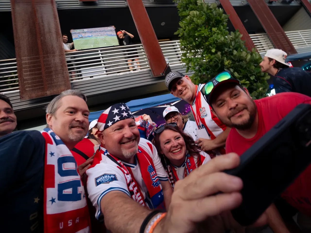 Photos: When the World Cup came to town 3 American Outlaws St. Louis Chapter President Kevin Marshall (second from left) takes a selfie alongside club members and St. Louisans who set up their TV for hundreds to watch after a power outage cut the USMNT vs. Paraguay stream outside Amsterdam Tavern on Friday, June 12, in south St. Louis.