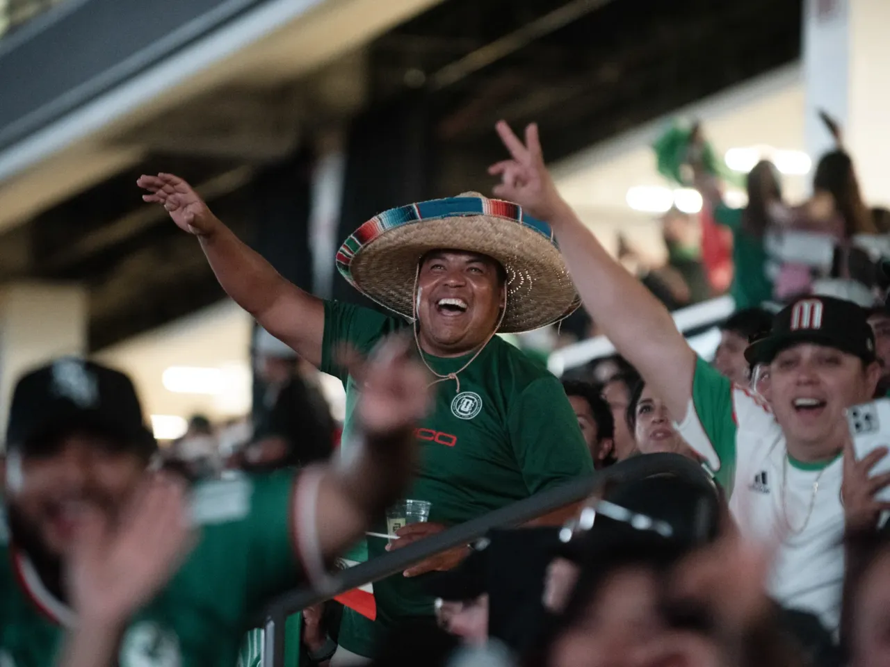 Photos: When the World Cup came to town 9 Mexico fans cheer their team during the team's Tuesday, June 30, game against Ecuador at a watch party hosted at the Frontwave Arena in Oceanside, Calif.