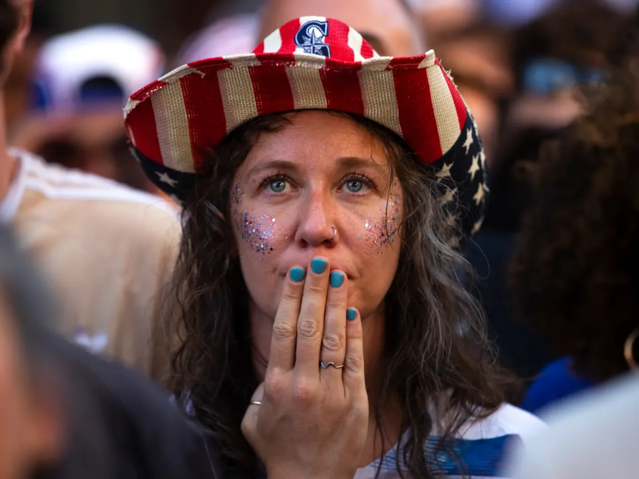 Photos: When the World Cup came to town 13 Hannah Bourne, of Edmonds, Wash., reacts during the second half of the FIFA World Cup knockout round match between the U.S. and Belgium during a watch party on Monday, July 6, at Occidental Square in Seattle's Pioneer Square neighborhood. The U.S. lost, 4-1.