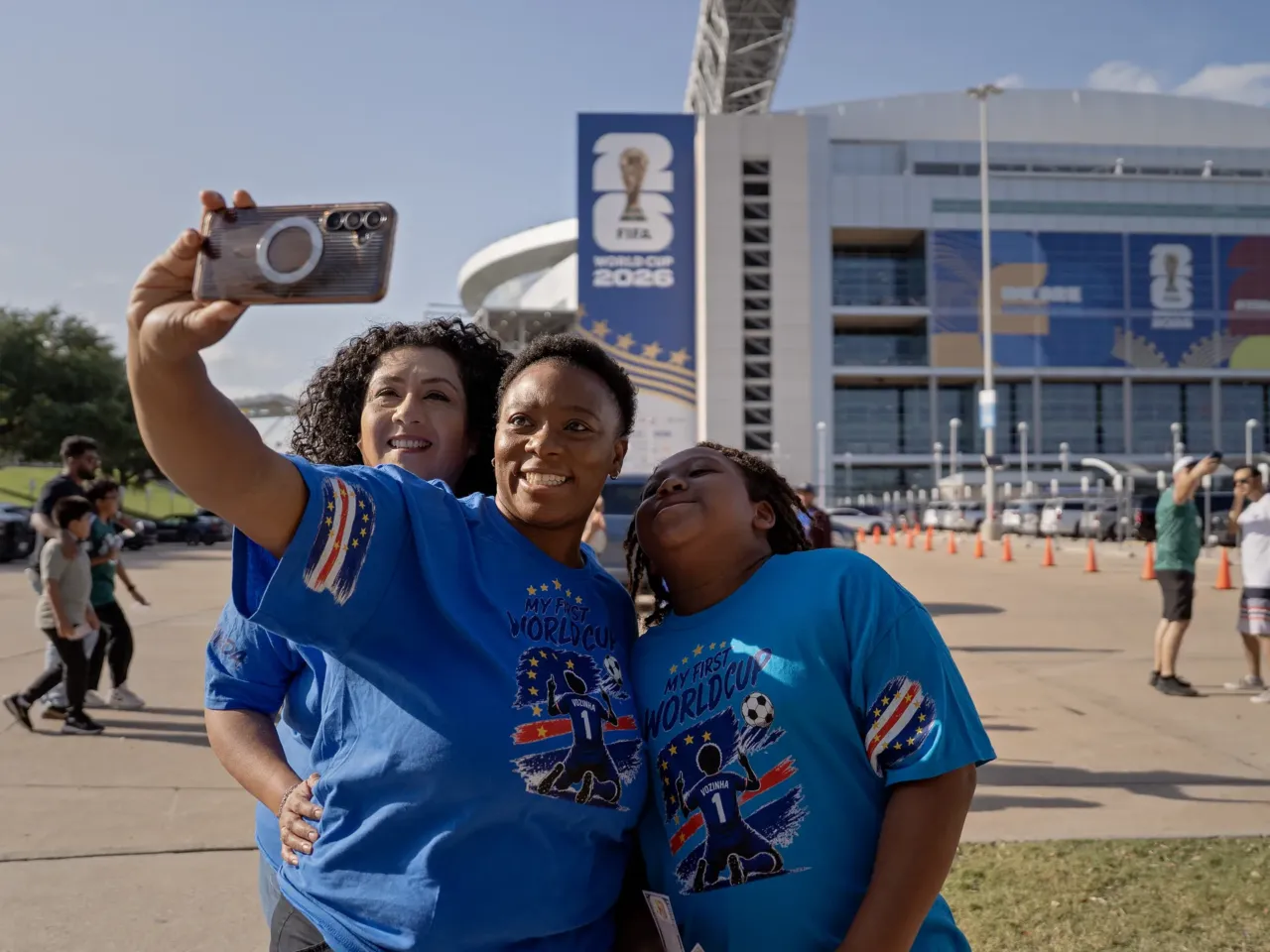 Reporter's Notebook: Finding World Cup joy in speaking to women who love soccer 5 Cabo Verde fans take pictures before the match between Cabo Verde and Saudi Arabia during FIFA World Cup at the Houston Stadium in Houston, Texas, on June 26, 2026.