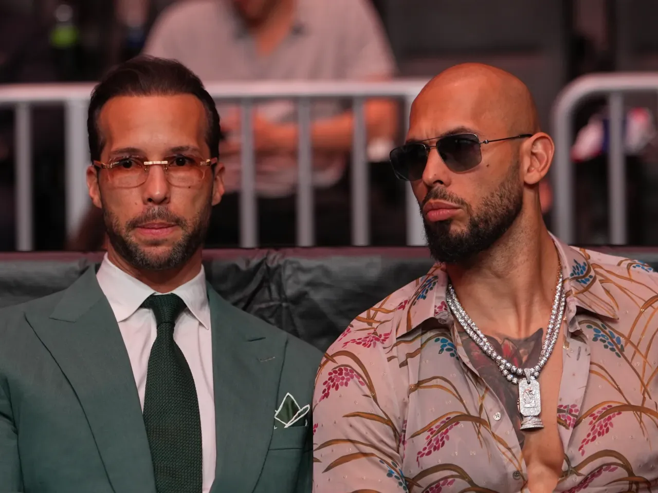 Andrew Tate, right, and his brother Tristan arrive an event, April 11, 2026, in Miami.