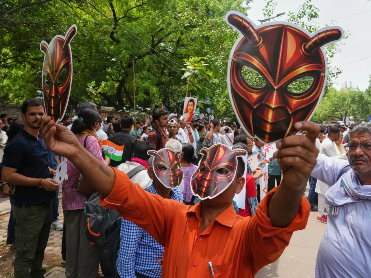 India's Gen Z 'Cockroach People's Party' started as satire but is serious about change 2 Supporters of the Cockroach Janta Party wear and display masks during a protest in New Delhi, Saturday.