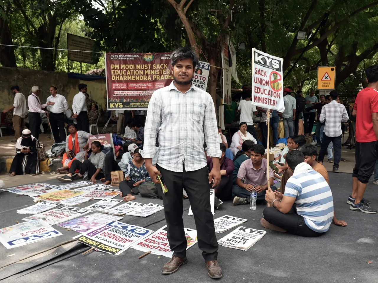 India's Gen Z 'Cockroach People's Party' started as satire but is serious about change 6 Shams Tabrez, seen at the New Delhi protest on June 25, says he could not qualify to be a public school teacher because he alleges the recruitment officials sought a bribe, which he refused to pay.