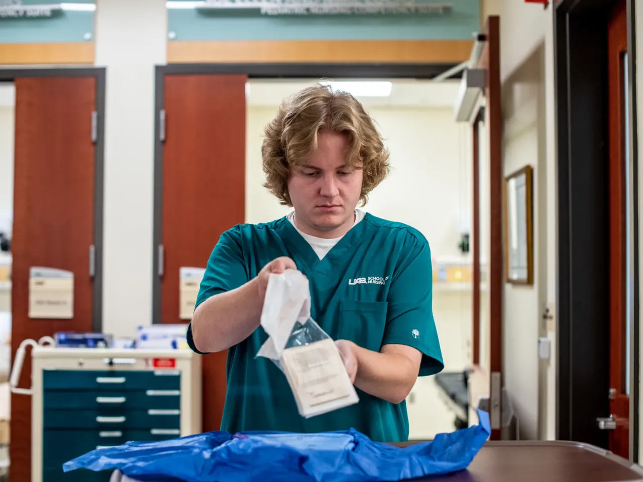 Ethan Stinson chose to go into nursing his first year of college, drawn by the job security. He's headed for a job in a hospital psychiatric unit. "I think I'm pretty calm under stress," he says.
