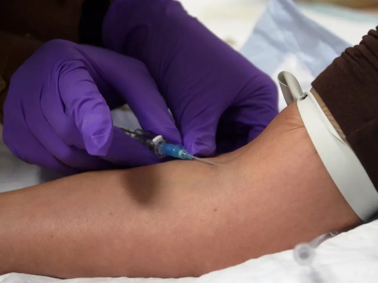 In this image taken from video, an IV infusion is administered at Pure Alchemy Wellness in Chula Vista, Calif., in November 2025.