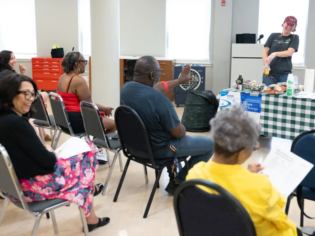 The White House pushes healthy eating. It cut a landmark nutrition education program 3 Jules Koehl, community nutrition coordinator for The Food Trust, shows community members how to prepare a black-eyed pea and corn salad at Spectrum Health in Philadelphia. The cooking demonstration was supported by SNAP-Ed funding.