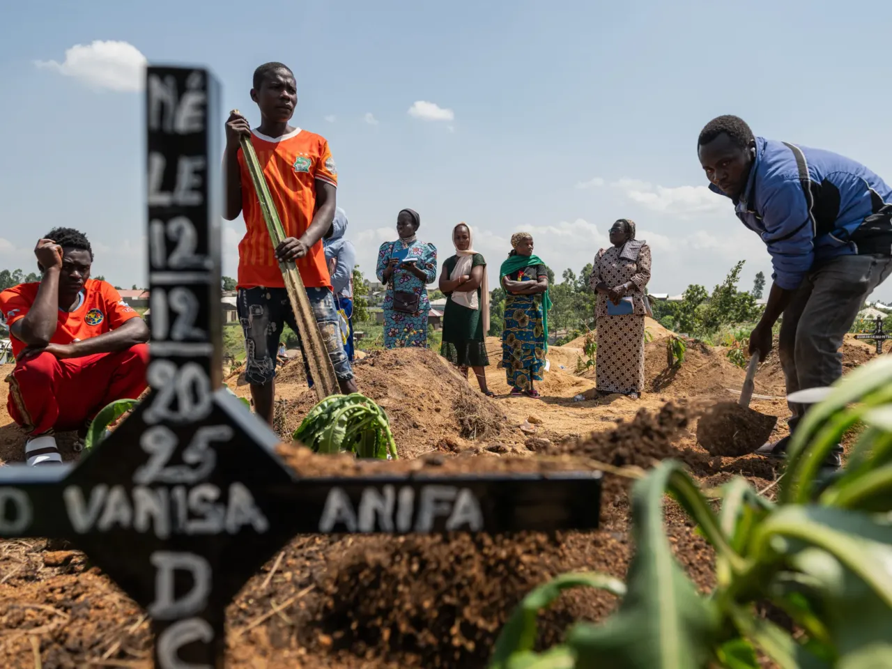 Relatives of Vanisa Anifa, a 6-month-old orphaned girl who died of Ebola, attend her burial, in Bunia, Congo, Friday, June 19, 2026.