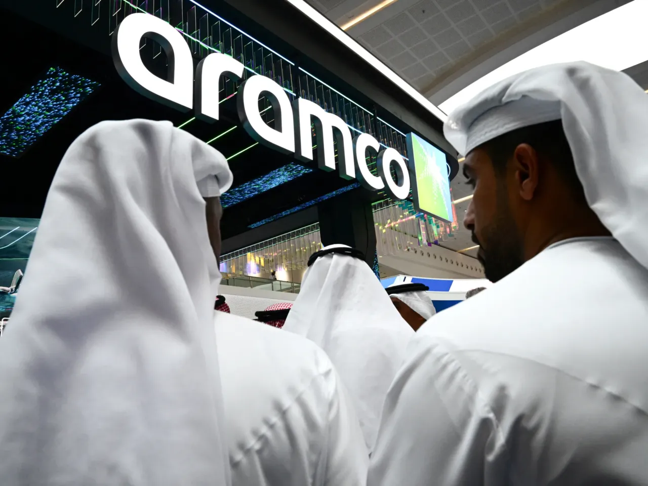 Trump says Saudi Arabia's nuclear deal hinges on the kingdom normalizing Israel ties 1 Guests stand at the booth of Saudi Arabia's Aramco oil company during the Abu Dhabi International Petroleum Exhibition & Conference, in Abu Dhabi, United Arab Emirates, on Nov. 3, 2025.