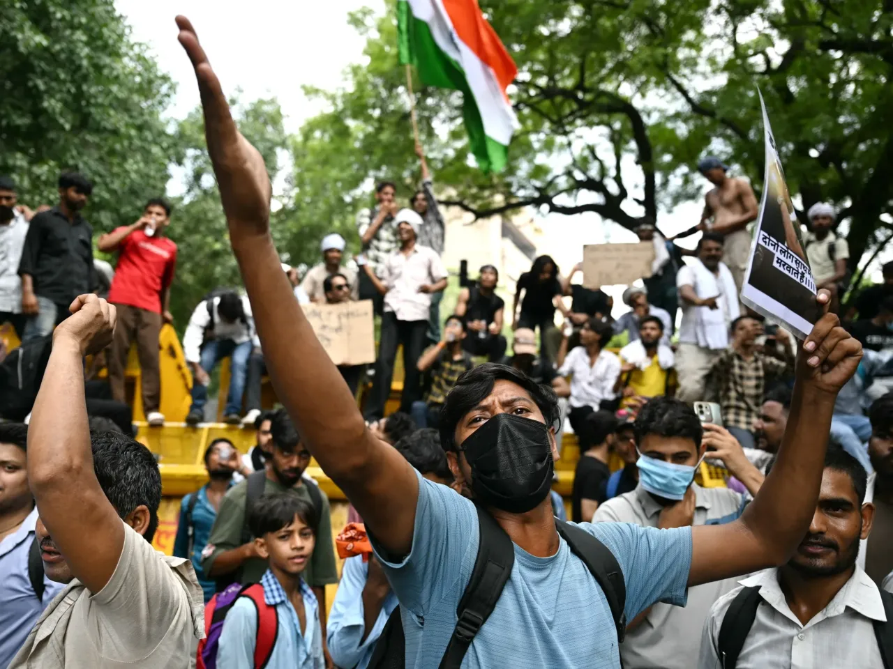 India's 'cockroach' movement ousts minister, but can Modi calm youth? 2 A Cockroach Janta Party (CJP) supporter shouts slogans at Jantar Mantar in New Delhi on July 23, 2026 during the ongoing protest to demand the resignation of India's Education Minister Dharmendra Pradhan.