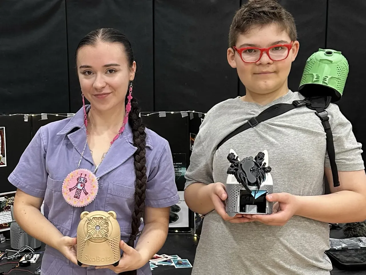 Holden Hoy (right) is building a robot to help him learn the Ojibwe language Anishinaabemowin, an endangered Native American language. Hoy's mentor, Danielle Boyer (left), is teaching him skills including coding and electrical circuitry.