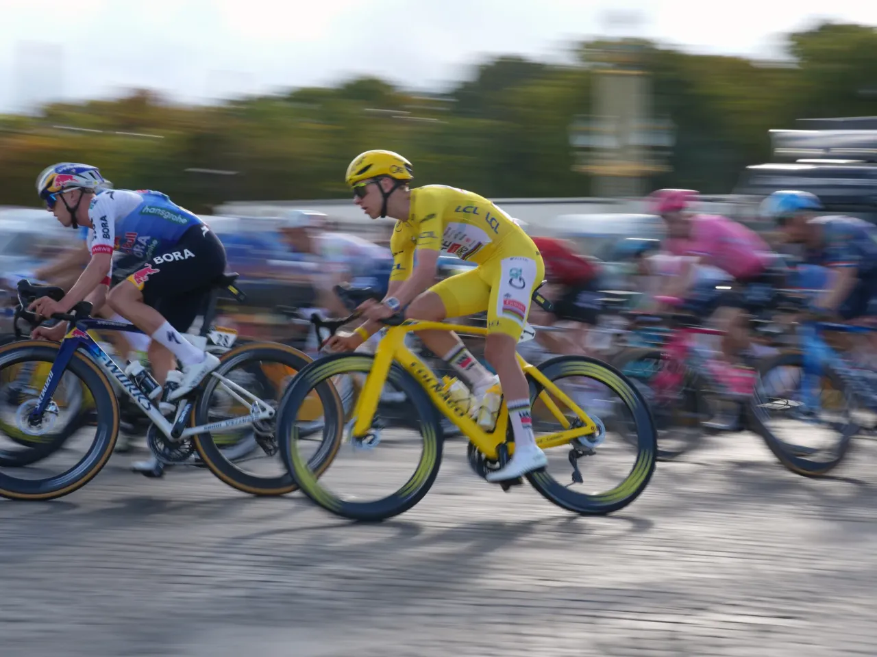 Slovenia's Tadej Pogacar, wearing the overall leader's yellow jersey, rides during the last stage of the Tour de France cycling race with start and finish in Paris, Sunday, July 26, 2026.